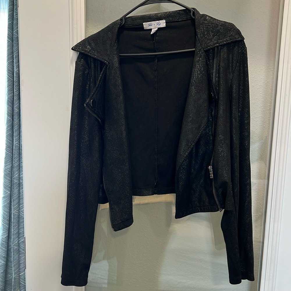 Woman’s fake leather jacket size Large